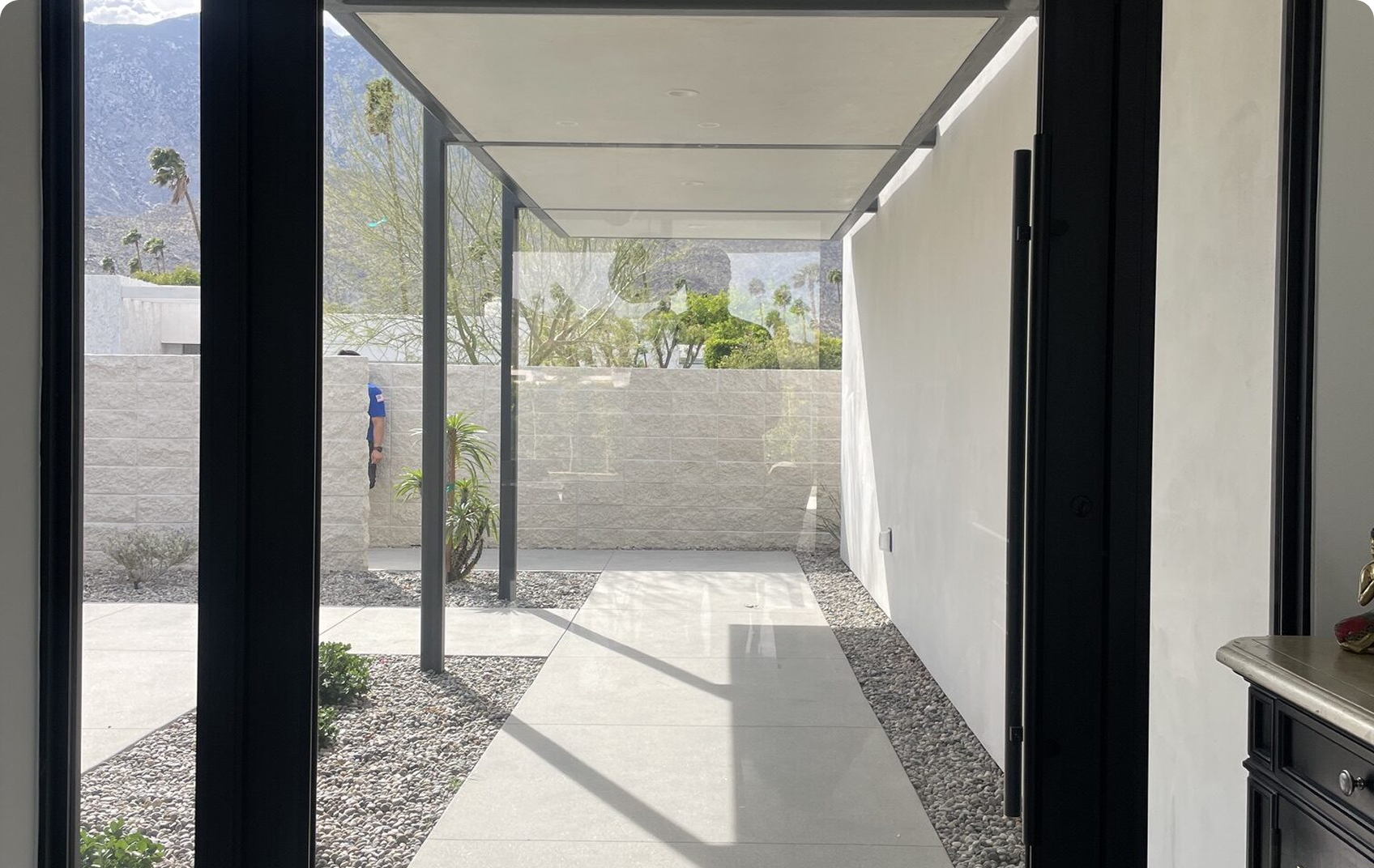 Covered walkway with garden scenery