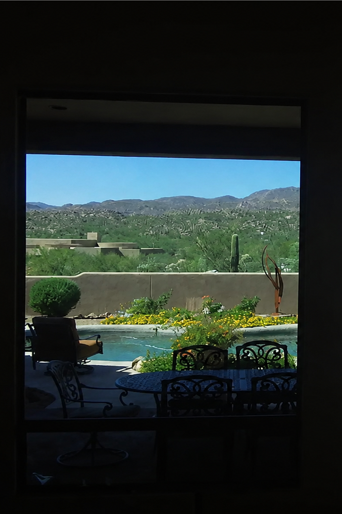 Backyard pool with desert mountains view